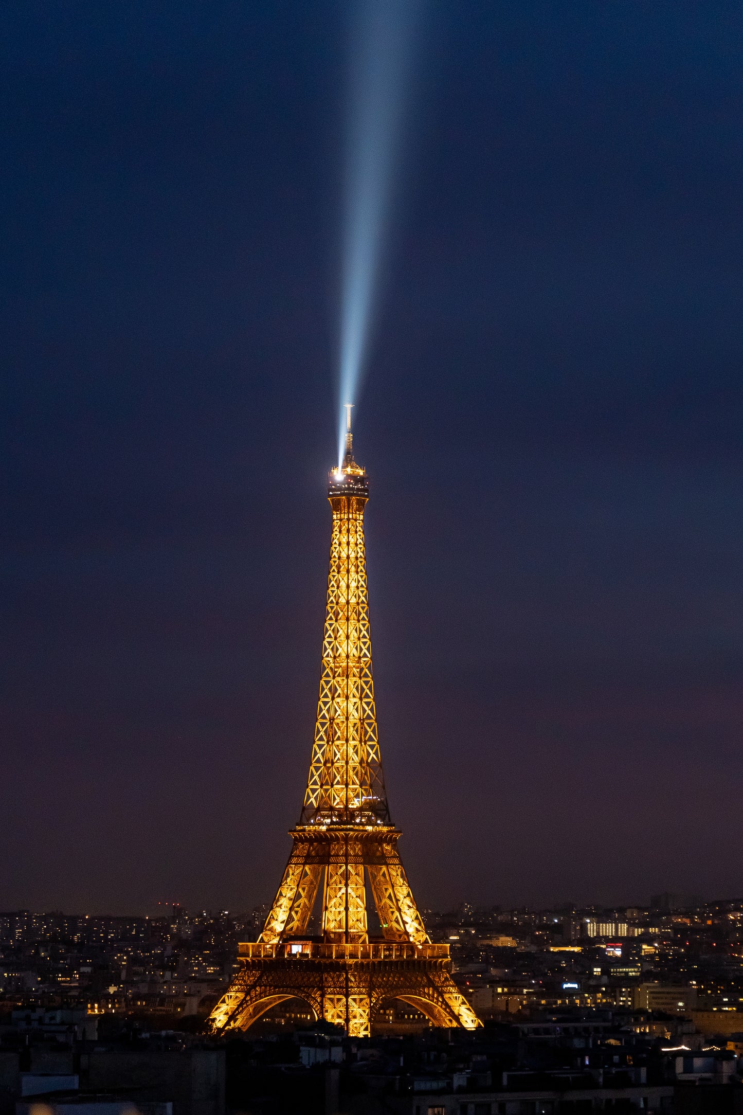 Eiffel Tower at the night flashing light.